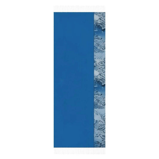 Blue scarf with white tassels and a detailed gray floral patterned edge