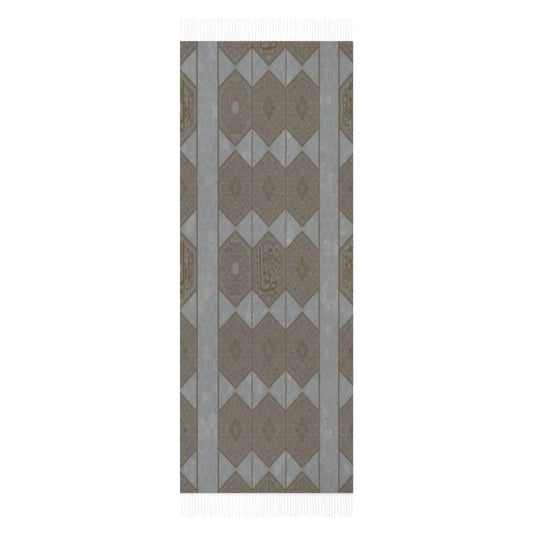 Geometric patterned tassel scarf with hexagonal and floral motifs in muted gray and brown colors