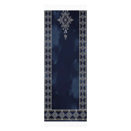 Navy blue prayer rug with intricate geometric and floral patterns and white fringes on both ends