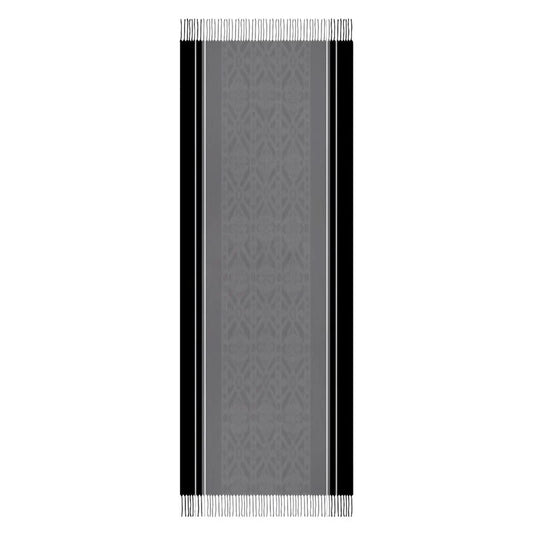 Black and gray tassel scarf with geometric pattern and fringed edges on white background