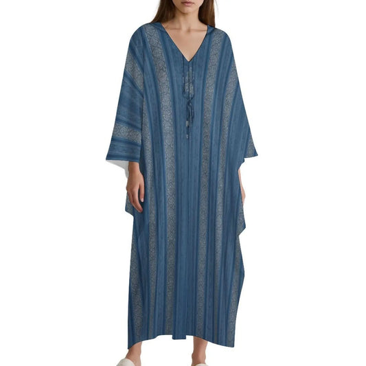 Woman wearing blue striped V-neck kaftan dress with 3/4 sleeves on white background