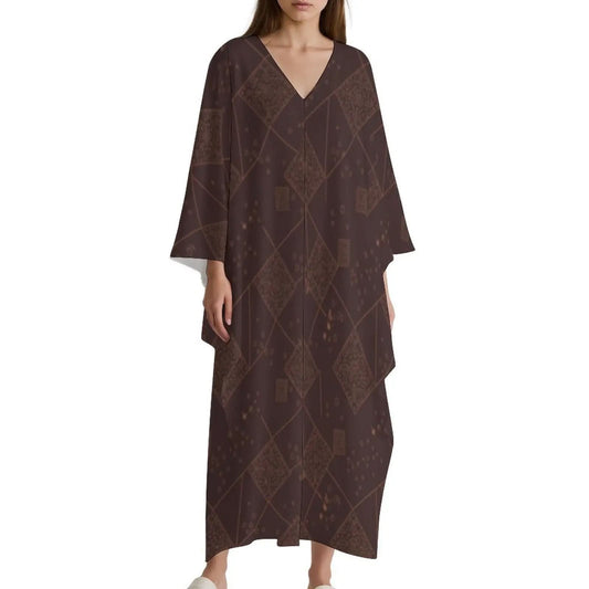 Woman wearing a brown v-neck geometric patterned kaftan dress with wide sleeves and relaxed fit