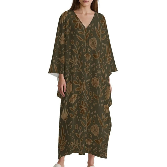 Woman wearing olive green v-neck kaftan dress with brown floral pattern on white background