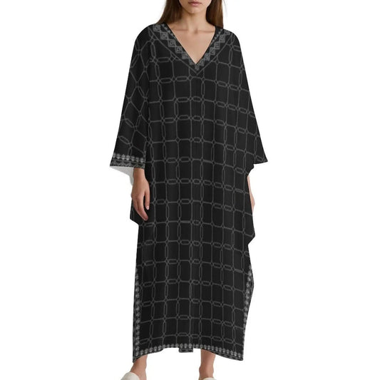 Black V-neck kaftan dress with gray chain-link pattern and wide sleeves on model
