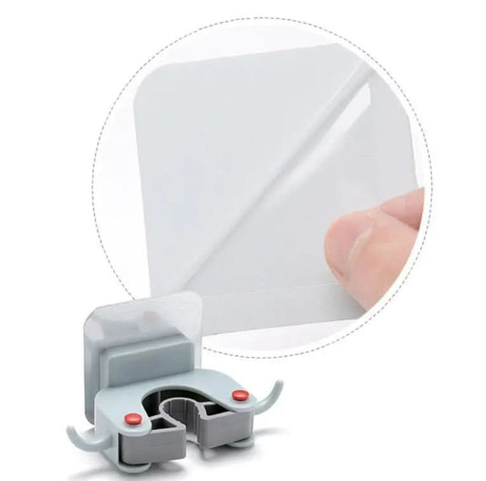 Nail-free traceless mop and broom holder with adhesive backing and dual hooks