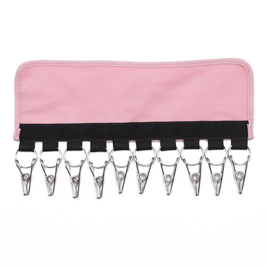 Pink fabric baseball hat clip with ten silver metal clothespins for portable hat storage