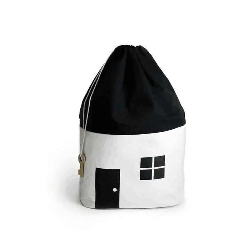 black and white cotton canvas toy storage bag designed like a house with door and window