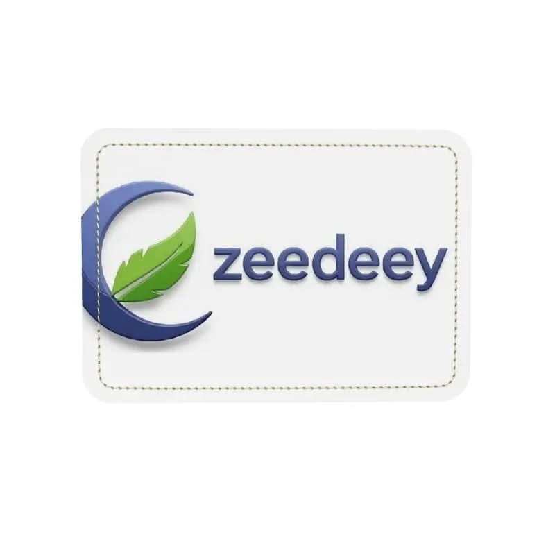 White leather tag with blue crescent and green leaf logo, text zeedeey embossed