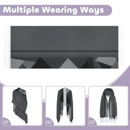 Gray tassel scarf with geometric patterns shown in three different wearing styles