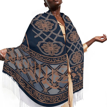 Dark blue patterned scarf with beige floral and geometric designs wrapped around a person