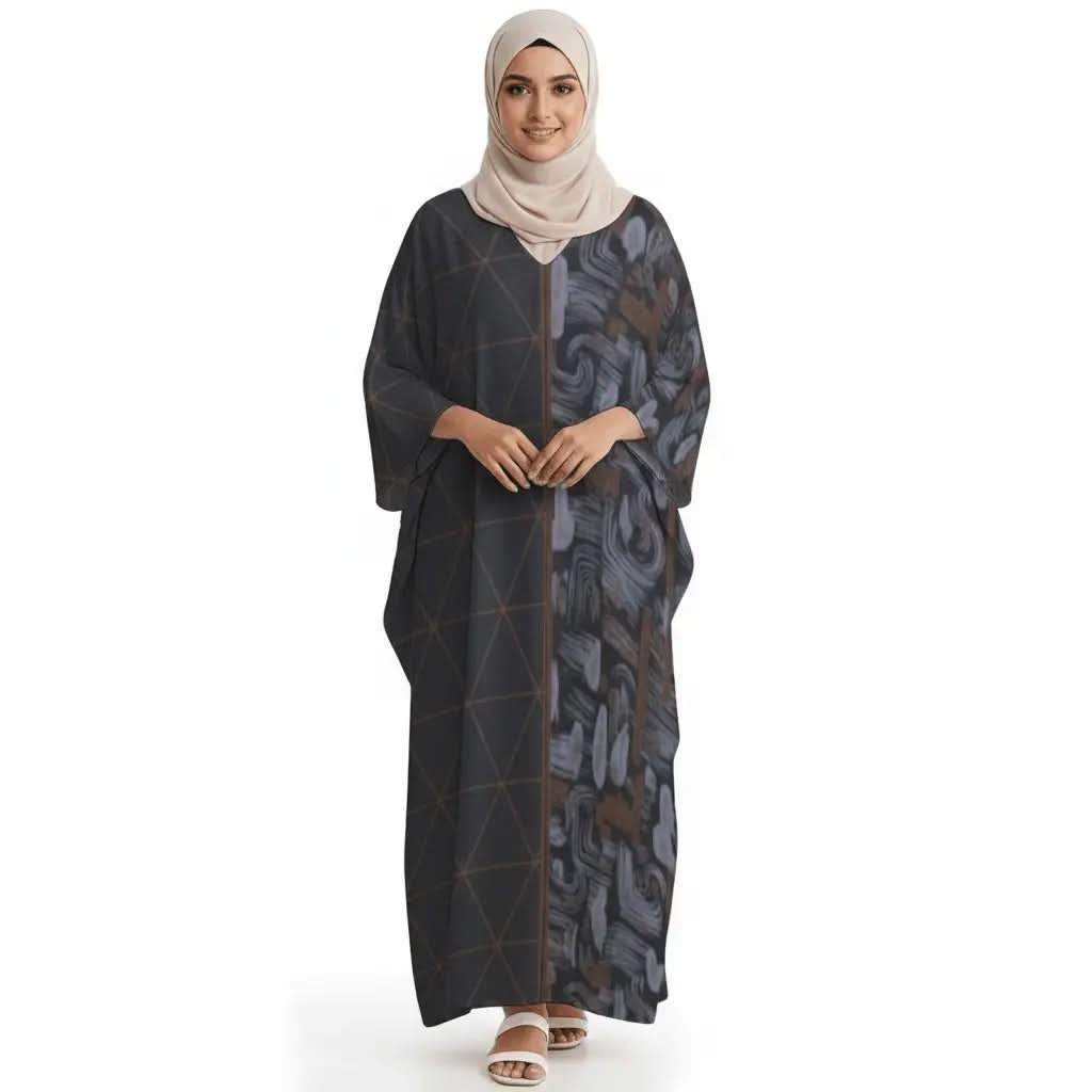 Woman in beige hijab wearing a black V-neck kaftan dress with geometric and abstract patterns