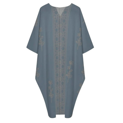 Blue V-neck kaftan dress with beige floral and geometric patterns, loose fit and elbow-length sleeves