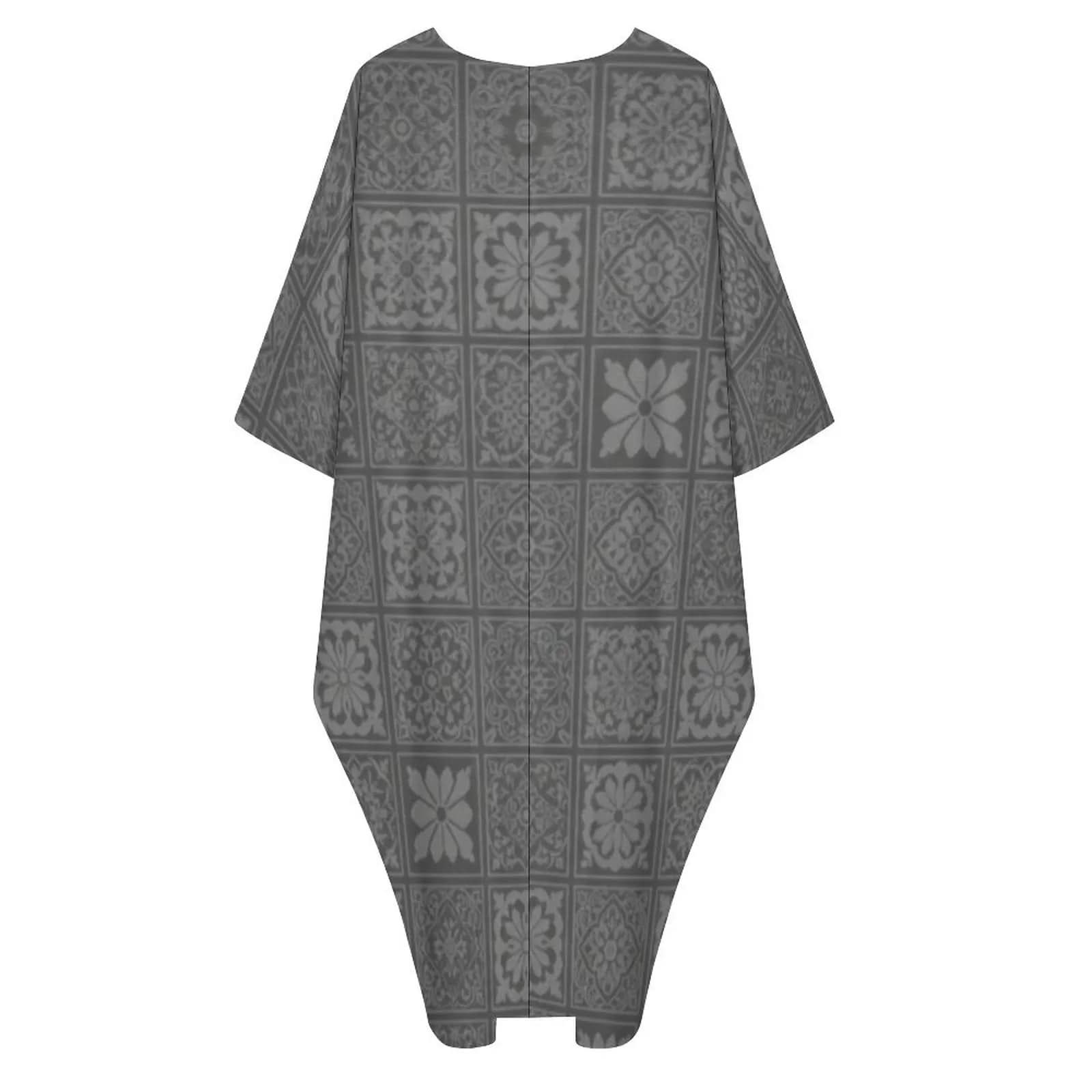 V-neck kaftan dress with grey floral and geometric tile pattern, loose fit and mid-length sleeves