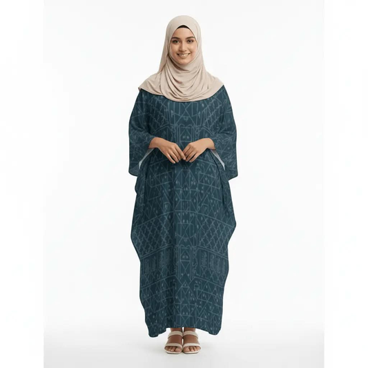 Woman wearing a dark blue V-neck kaftan dress with geometric patterns and a beige hijab