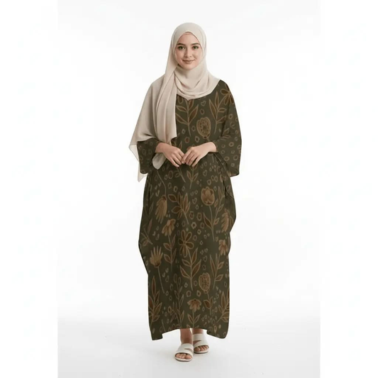Woman wearing olive green floral print kaftan dress with beige hijab and white sandals on white background
