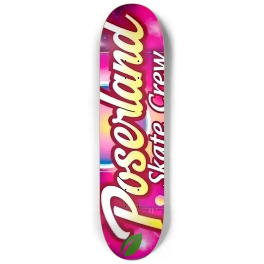 Pink skateboard deck with colorful background featuring 'Poserland Skate Crew' text and green leaf logo